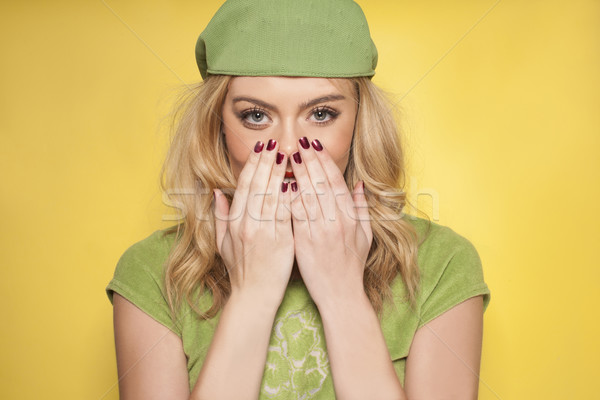 Beautiful woman showing off her manicured nails Stock photo © stryjek