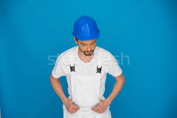 Workman in a blue hardhat Stock photo © stryjek