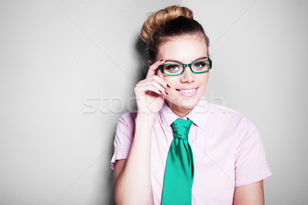 Beautiful nerdy young woman in glasses Stock photo © stryjek