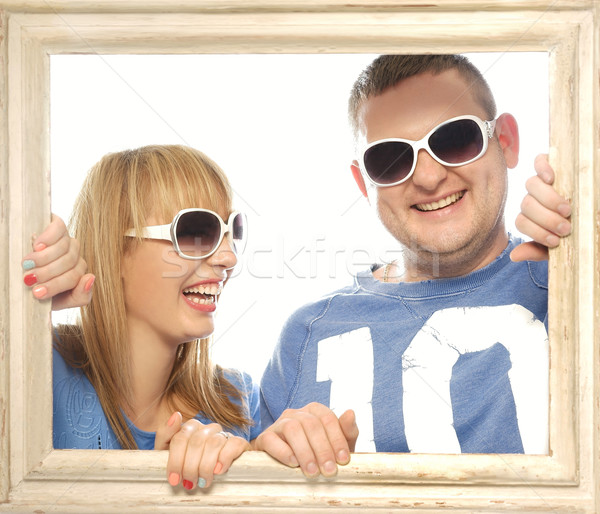 Loving couple in picture frame. Stock photo © stryjek