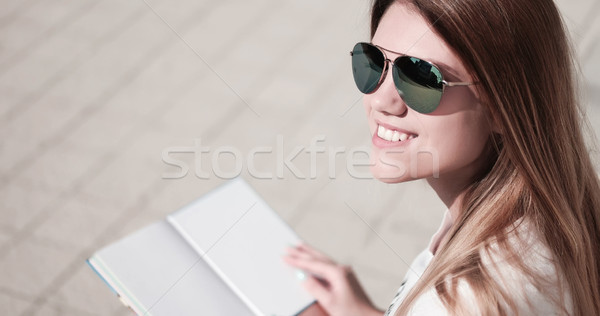 Stock photo: student reading a book