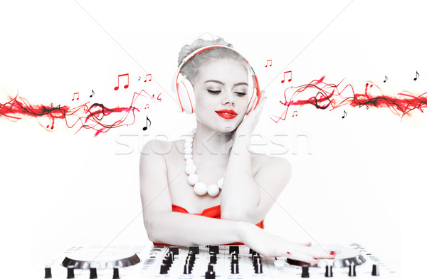 Beautiful disc jockey mixing music Stock photo © stryjek