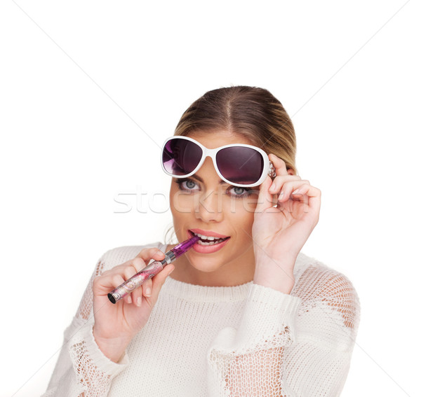 Młoda kobieta papierosów okulary strony włosy Zdjęcia stock © stryjek