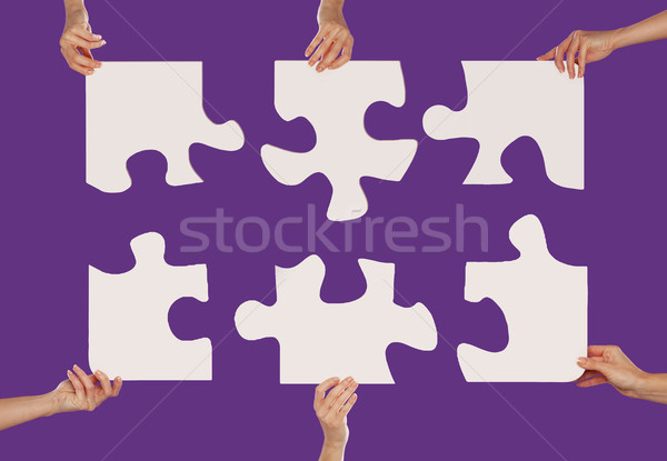Hands and puzzle Stock photo © stryjek
