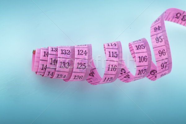 Rosa têxtil fita métrica medição comprimento escala Foto stock © stryjek