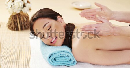 Pretty woman lawa kamień masażu hot Zdjęcia stock © stryjek