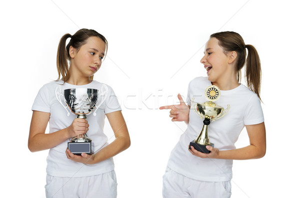 Two Young Pretty Girls Holding Trophies Pose Stock photo © stryjek