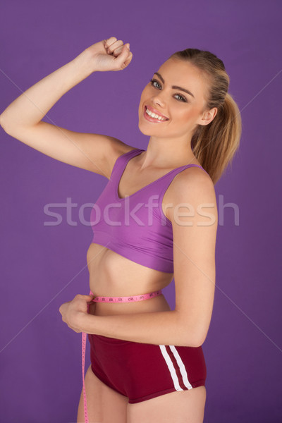 Woman taking body measurements Stock photo © stryjek