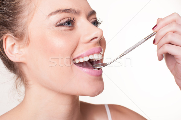 Attractive woman with beautiful white teeth Stock photo © stryjek