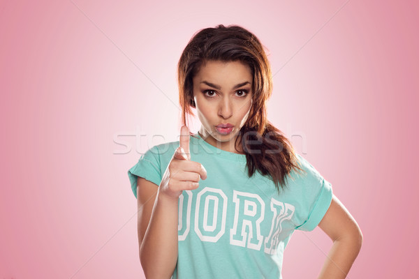 Beauté brunette rose recrutement femme pointant Photo stock © stryjek