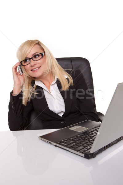 Businesswoman in glasses working Stock photo © stryjek
