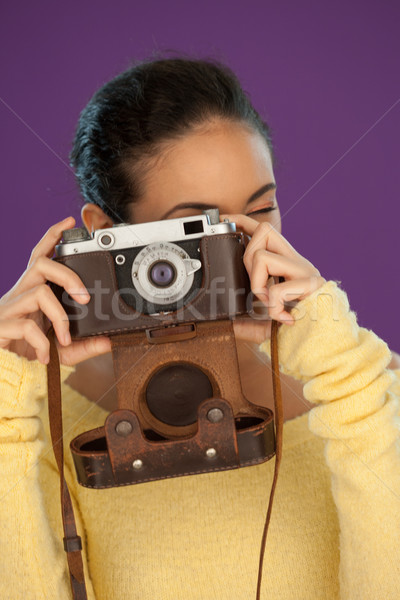 Woman using a vintage camera Stock photo © stryjek