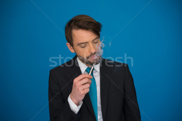Om de afaceri costum cravată albastru frumos Imagine de stoc © stryjek