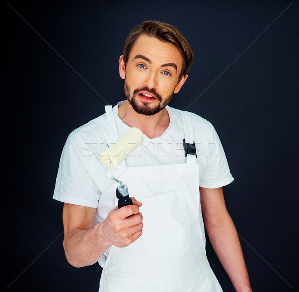 Stock photo: Painter holding a paint roller