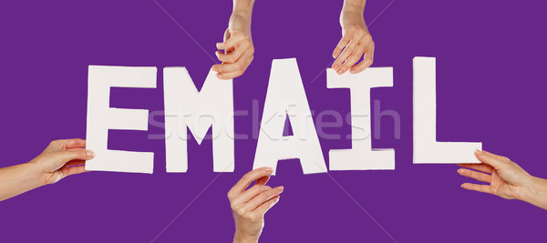 Stock photo: Female hands holding letters EMAIL