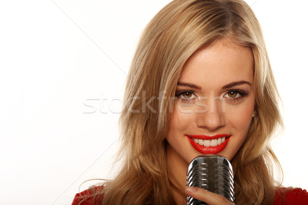 Smiling Woman Holding Microphone Stock photo © stryjek