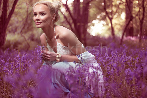 Artistic portrait of a girl in a bluebell forest Stock photo © stryjek