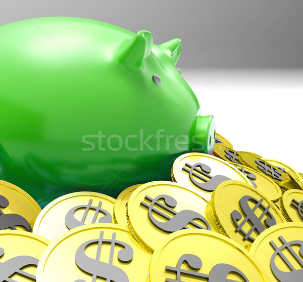 Piggybank Surrounded In Coins Shows American Finances Stock photo © stuartmiles