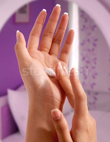 Putting Moisturizer On Her Hands Stock photo © stuartmiles