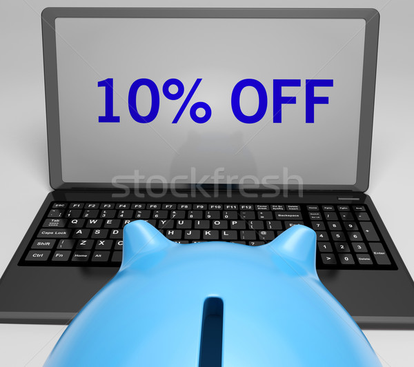 Stock photo: Ten Percent Off On Notebook Showing Reductions