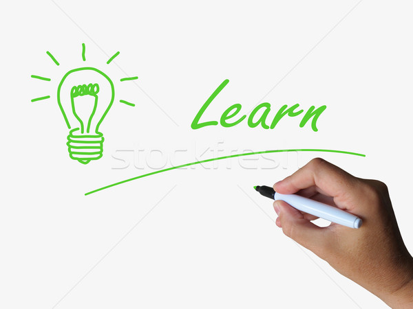 Learn and Lightbulb Means Training and Learning Skills or Knowle Stock photo © stuartmiles