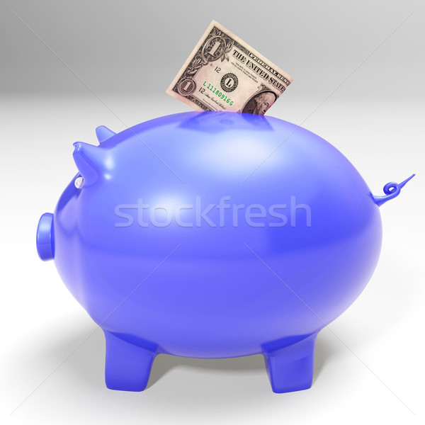 Dollar Entering Piggybank Showing American Savings Stock photo © stuartmiles
