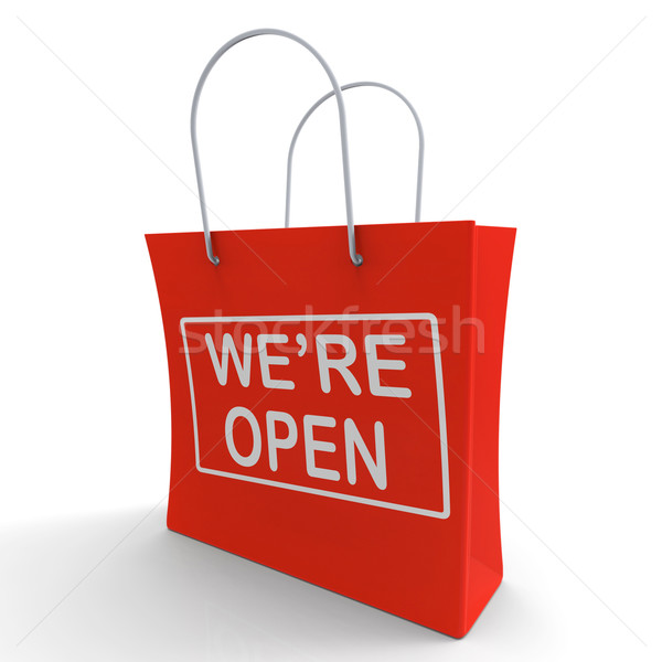 Stock photo: We're Open Shopping Bag Shows New Store Launch