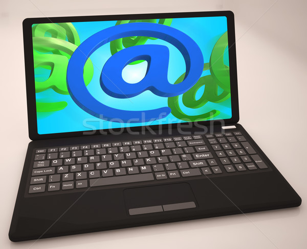 At Sign On Laptop Shows Websites Stock photo © stuartmiles