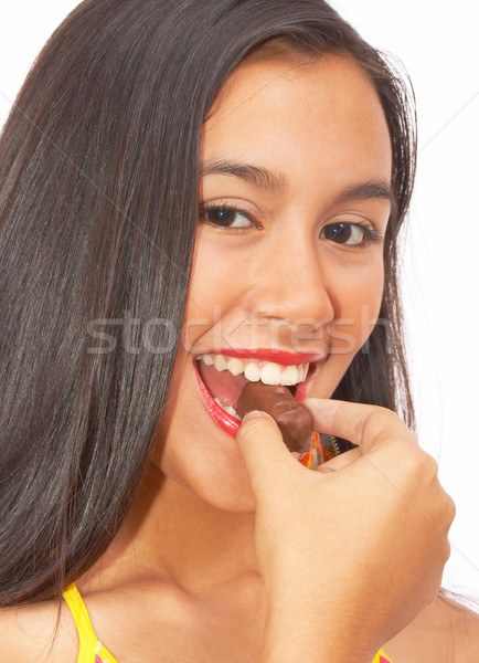 Girl Eating Some Chocolates Stock photo © stuartmiles