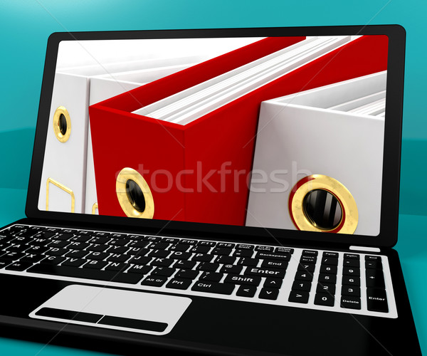 Rosso file bianco organizzato computer laptop Foto d'archivio © stuartmiles