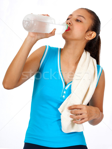 Sporty Girl Quenching Her Thirst Stock photo © stuartmiles