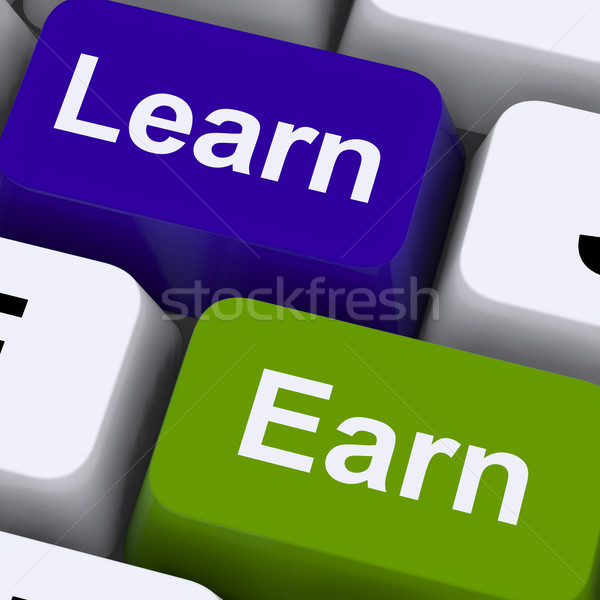 Stock photo: Learn And Earn Computer Keys Showing Working Or Studying