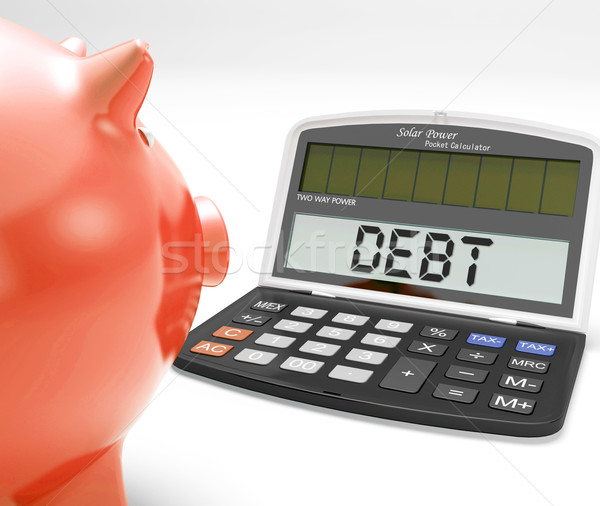 Stock photo: Debt Calculator Shows Credit Arrears Or Liabilities