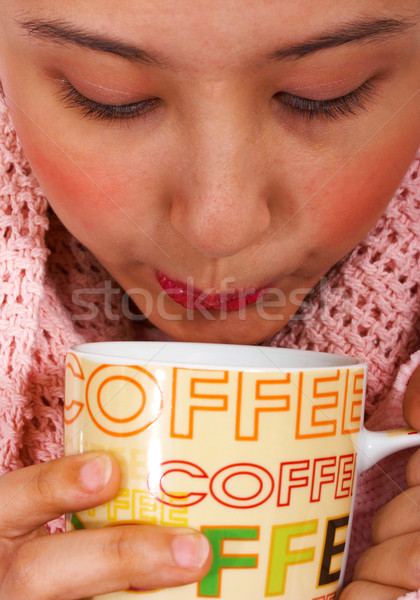 Keeping Snug And Warm With A Cup Of Coffee Stock photo © stuartmiles