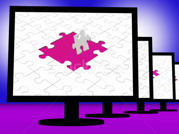 Unfinished Puzzle On Monitors Showing Completion Stock photo © stuartmiles