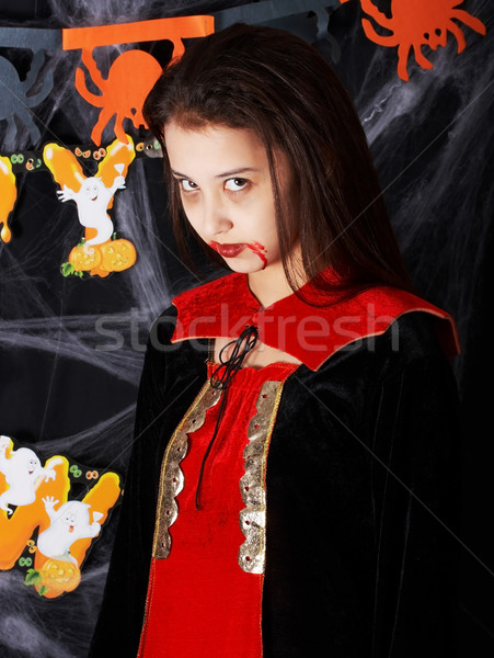 Girl In A Vampire Costume At Halloween Stock photo © stuartmiles