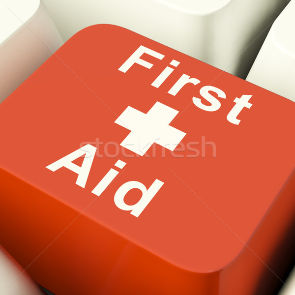 First Aid Computer Key Showing Emergency Medical Help Stock photo © stuartmiles