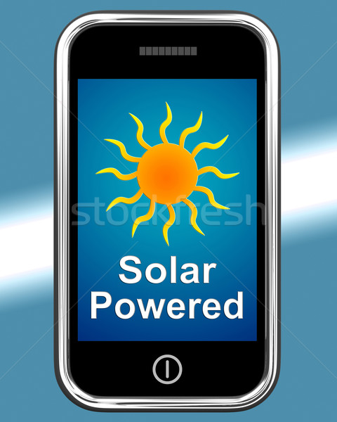 Solar Powered On Phone Shows Alternative Energy And Sunlight Stock photo © stuartmiles