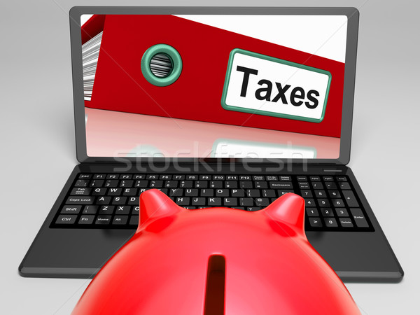 Taxes File On Laptop Shows Taxation Stock photo © stuartmiles