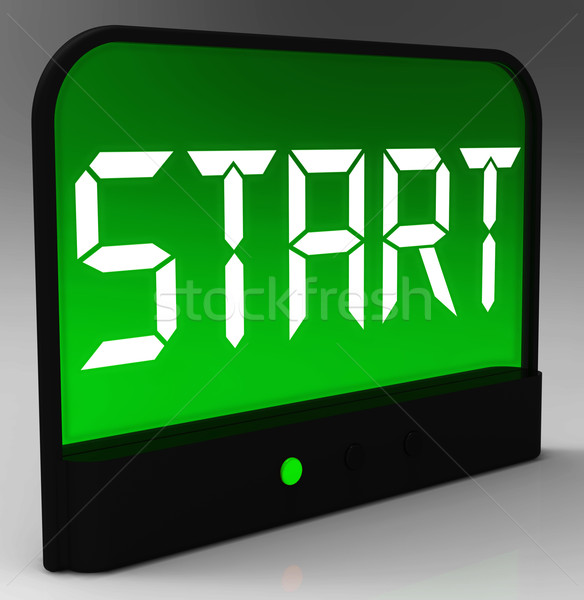 Start Button On Clock Shows Beginning Or Activating Stock photo © stuartmiles