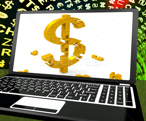 Dollar Symbol On Laptop Shows Online Currency Exchange Stock photo © stuartmiles