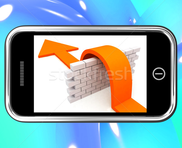 Arrow Jumping Wall On Smartphone Showing Conquer Stock photo © stuartmiles