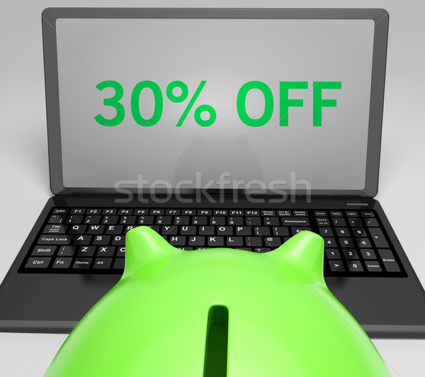 Thirty Percent Off On Notebook Showing Reductions Stock photo © stuartmiles