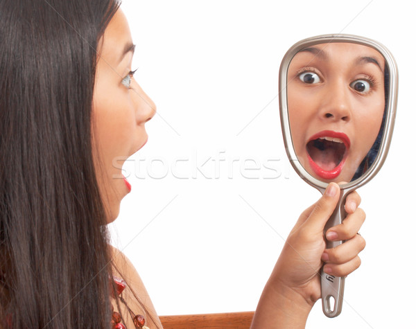 Fată uimit uita oglindă mână Imagine de stoc © stuartmiles