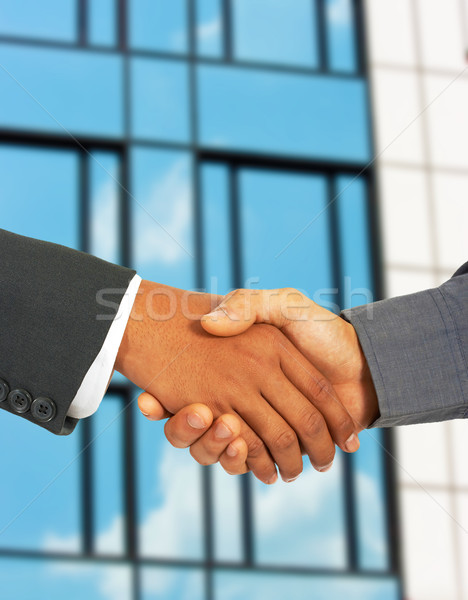 Businessmen Greet Each Other By Shaking Hands Stock photo © stuartmiles