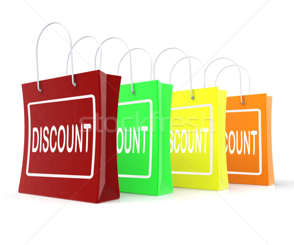 Discount Shopping Bags Means Cut Price Or Reduce Stock photo © stuartmiles