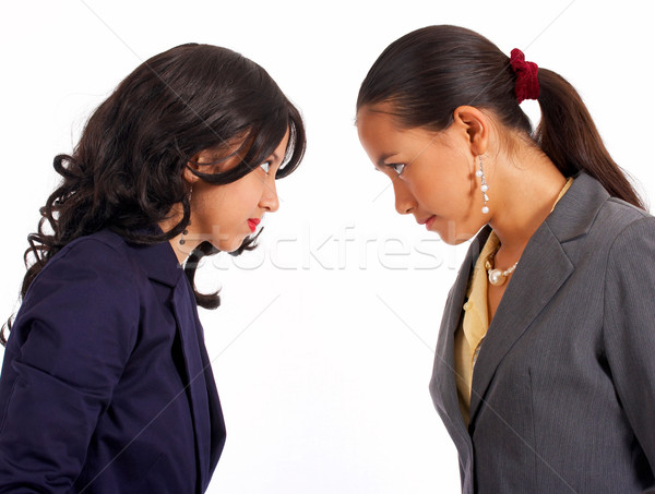 Meninas olhando outro dois amigos zangado Foto stock © stuartmiles