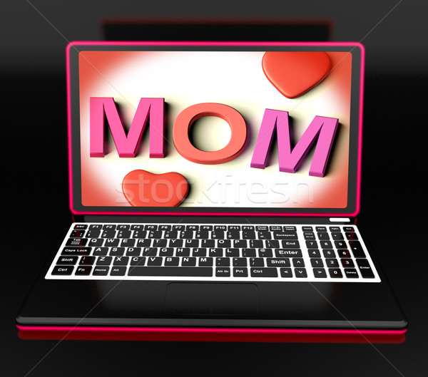Mom On Laptop Showing Digital Card Stock photo © stuartmiles