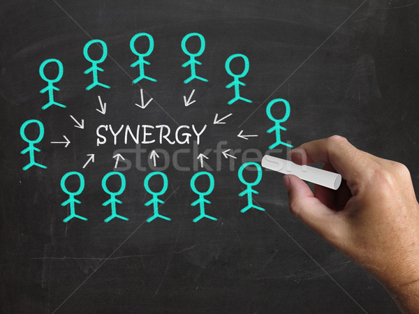 Synergy On Blackboard Means Teamwork And Partnership Stock photo © stuartmiles