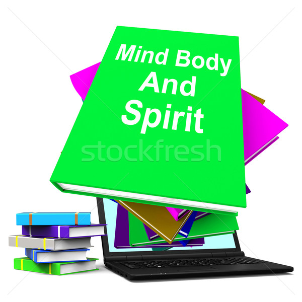 Mind Body And Spirit Book Stack Laptop Shows Holistic Books Stock photo © stuartmiles